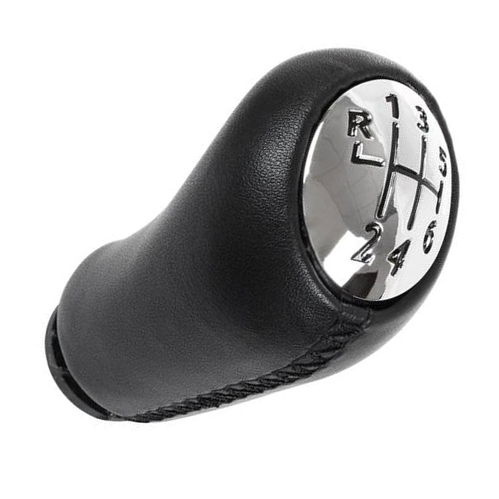 Fekete színű, bőrözött 6 sebességes Renault váltógomb. Krómozott számlappal.