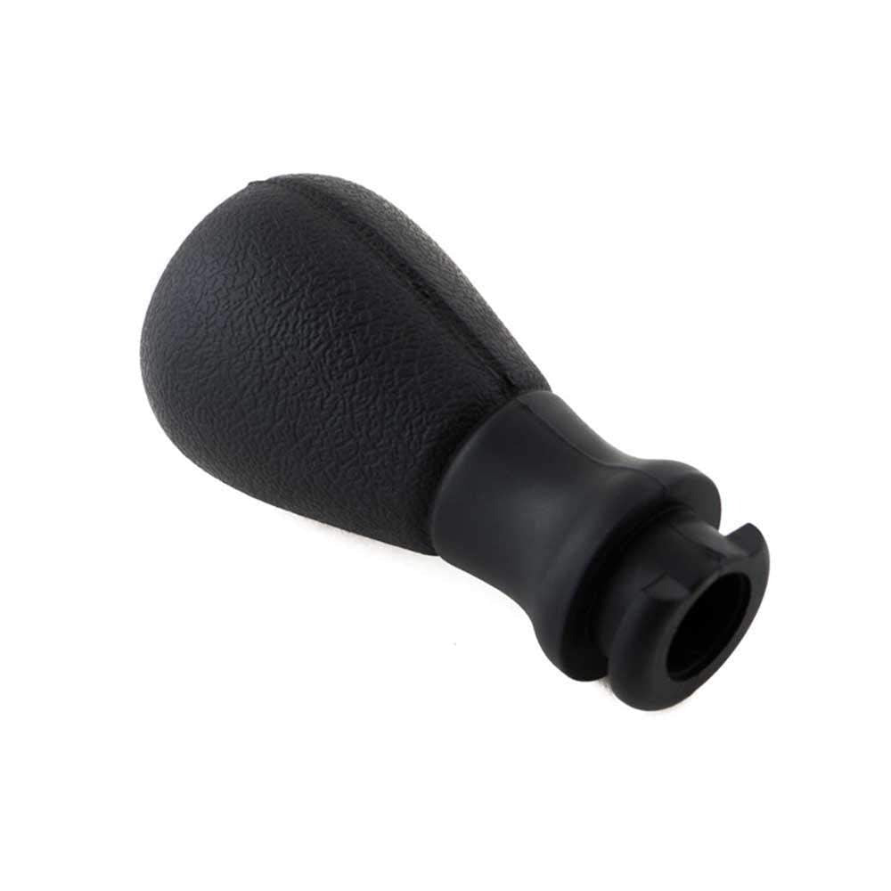 Fekete színű, 5 sebességes Peugeot váltógomb.