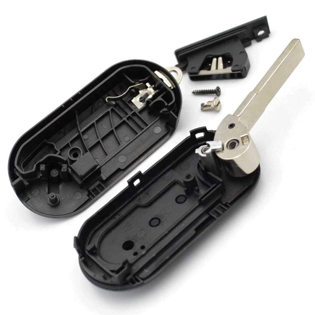 Fekete színű, 2 gombos Citroen  bicskakulcs, kulcsház belseje.