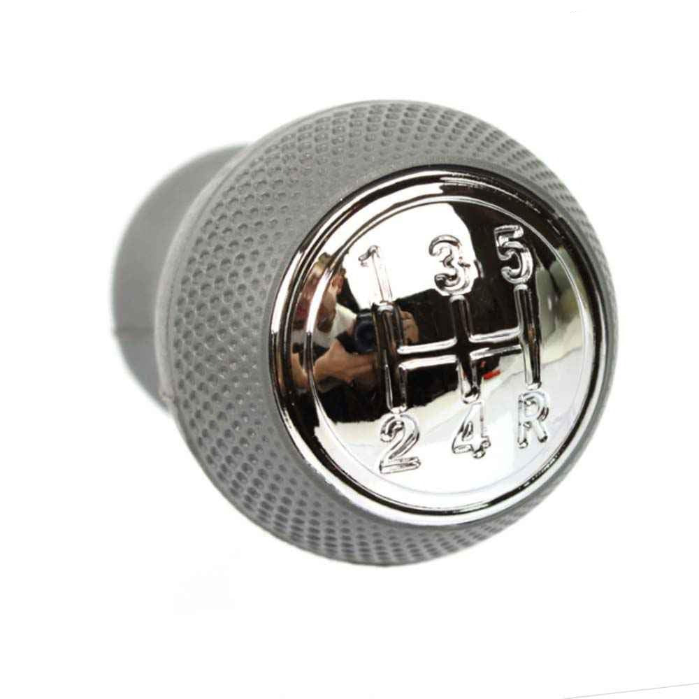 Szürke színű Mazda váltógomb. Krómozott, 5 fokozatos számlappal.