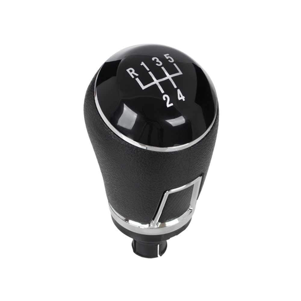 Fekete színű, 5 sebességes VW Passat váltógomb. Fekete színű, 5 fokozatos számlappal.