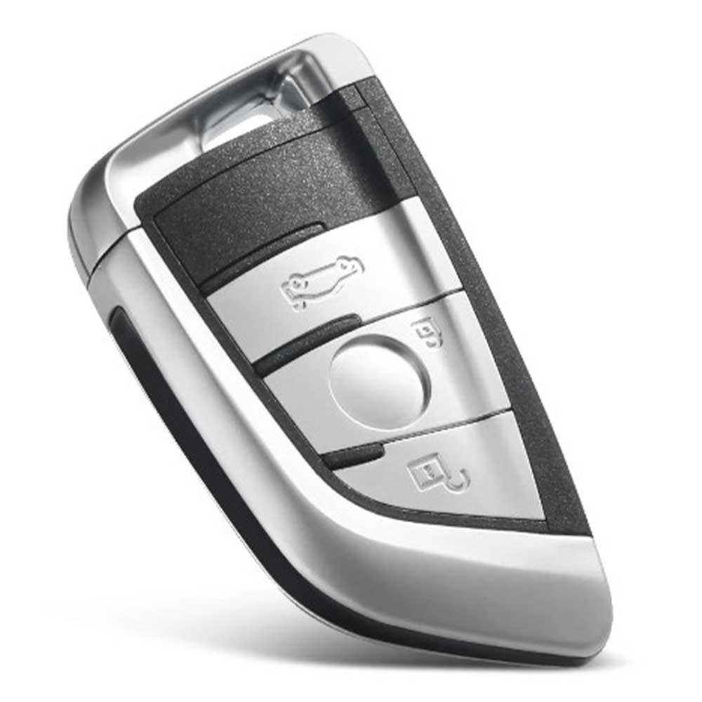 Ezüst és fekete színű, 3 gombos BMW kulcs, kulcsház.