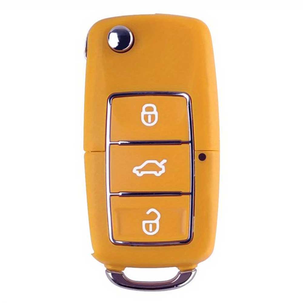 3 gombos, narancssárga színű Skoda bicskakulcs, kulcsház.