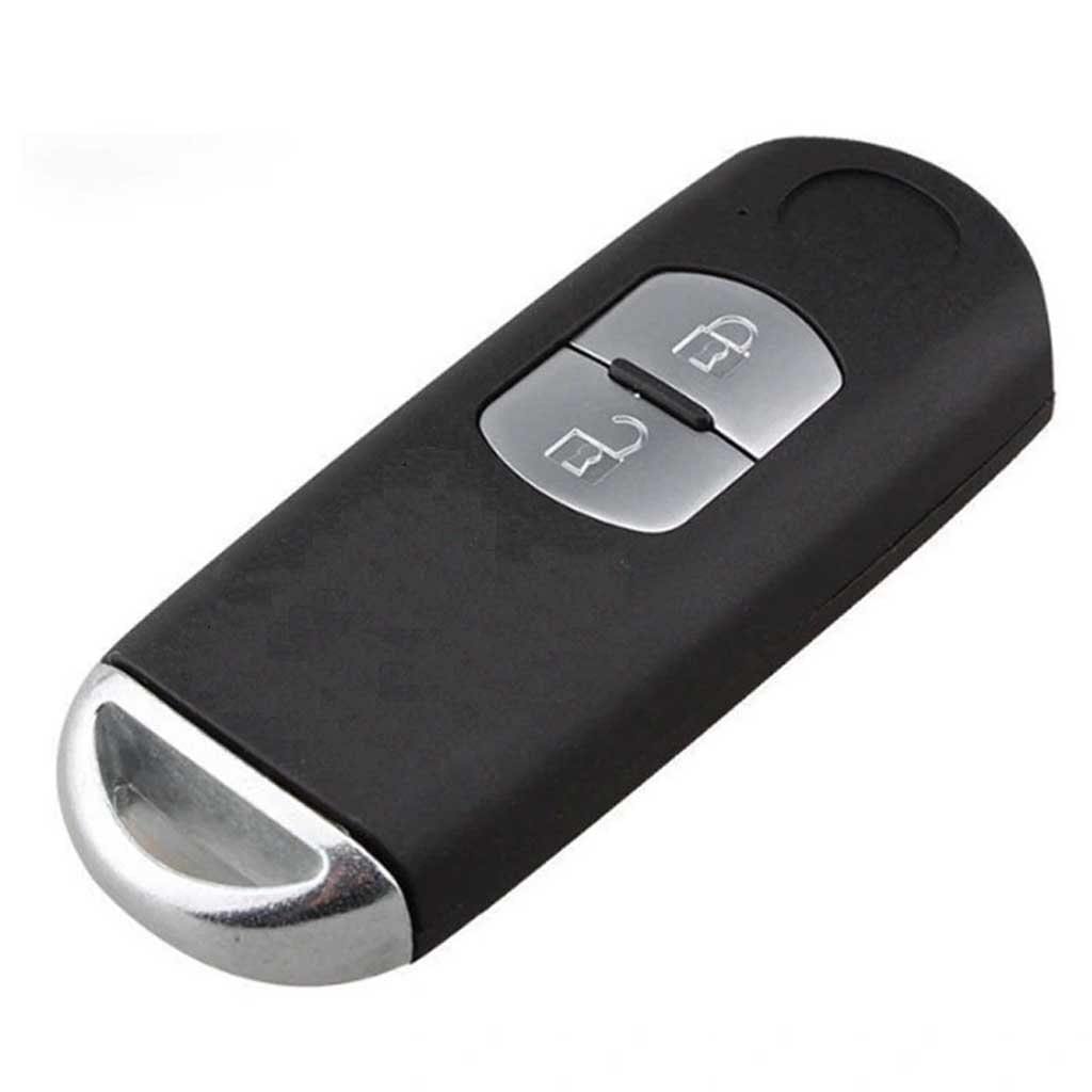 Fekete színű, 2 gombos Mazda kulcsház, kulcs ezüst színű gombokkal.