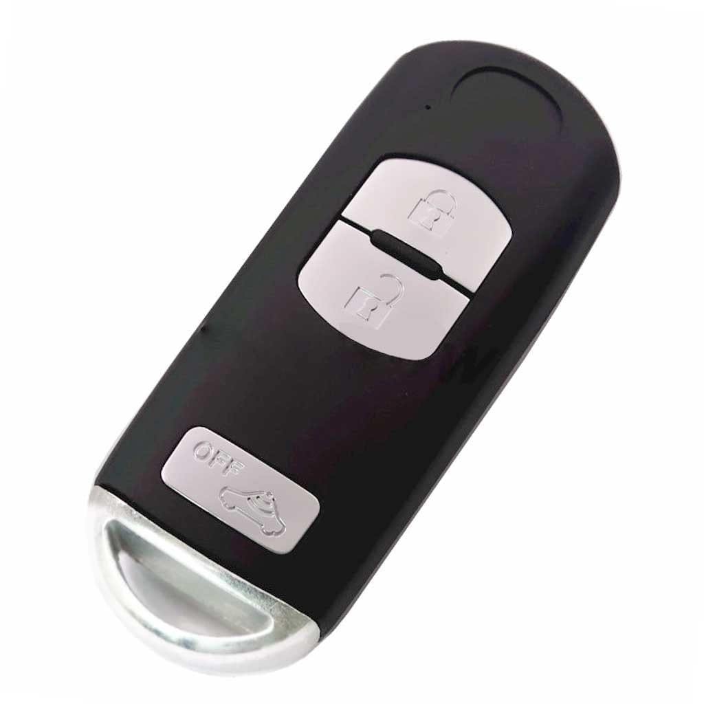 Fekete színű, 3 gombos Mazda kulcsház, kulcs ezüst színű gombokkal.