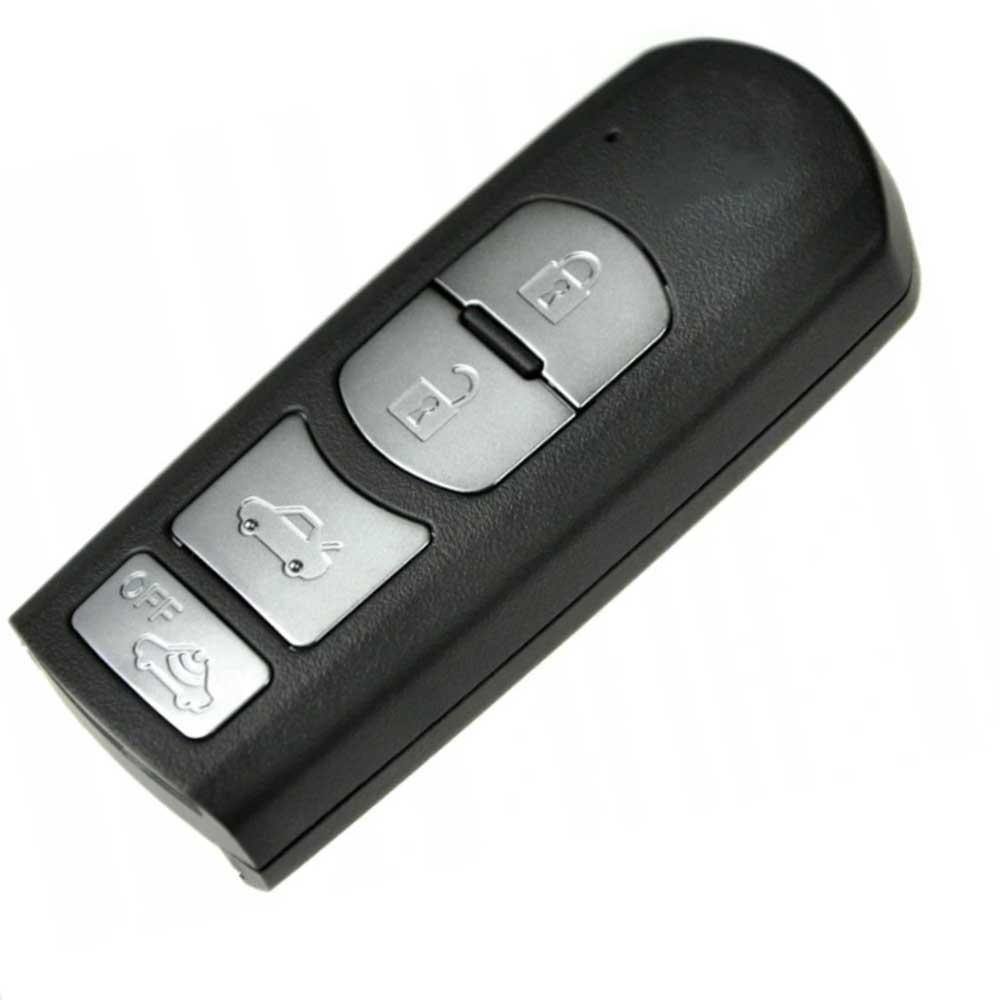 Fekete színű, 4 gombos Mazda kulcsház, kulcs ezüst színű gombokkal.